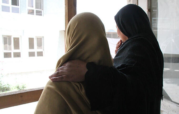 Zarmina and her mother. Some members of their family have blamed Zarmina for the abduction, but her mother has stood by her. © UNFPA Afghanistan